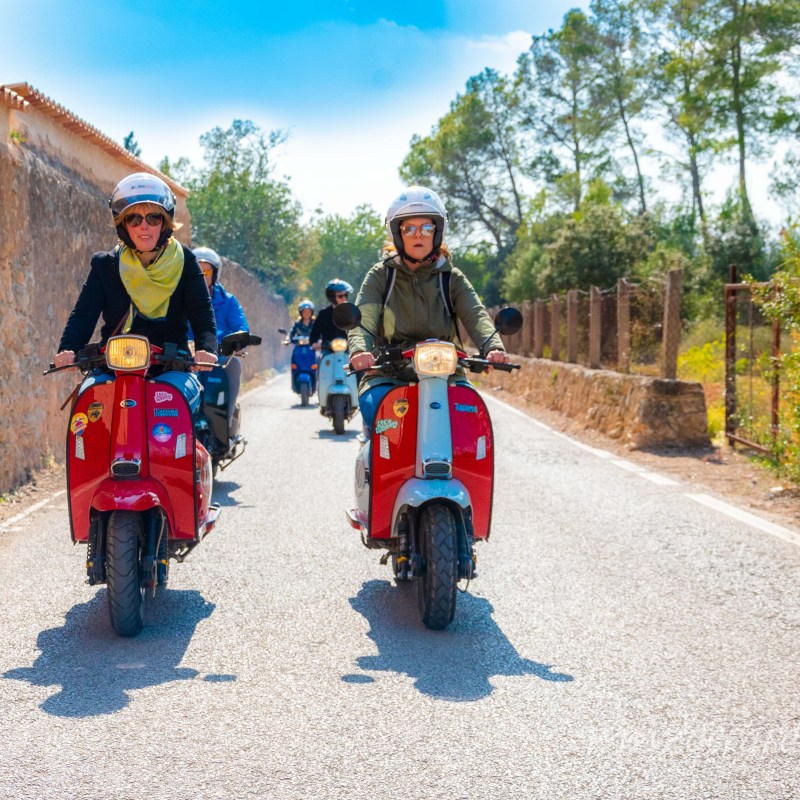 a man riding a motorcycle posing for the camera