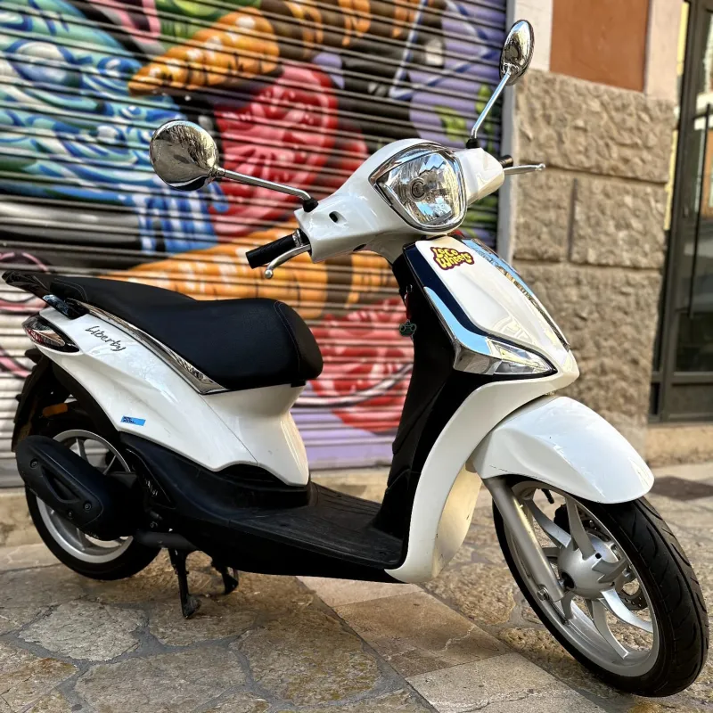 a motorcycle parked on the side of a building